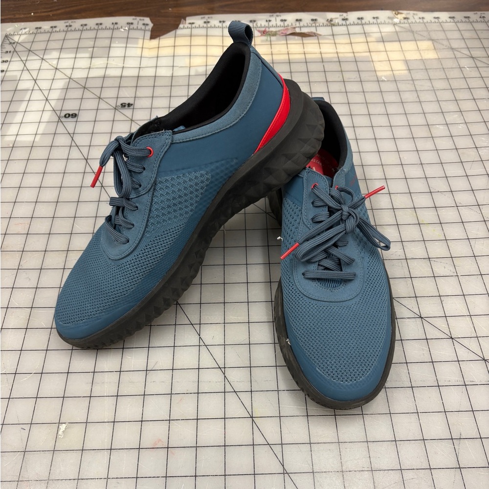 Blue Men's Athletic Shoes with red accents.